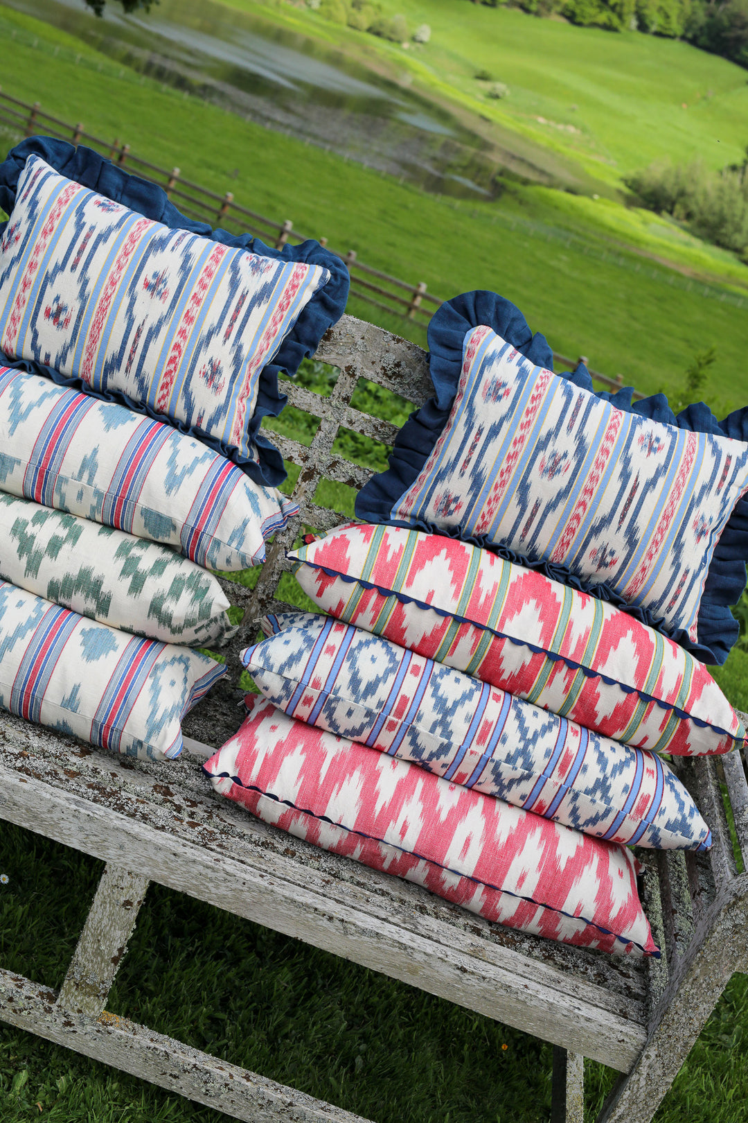 MALLORCAN FABRIC CUSHION - GREEN STRIPE WITH RED ZIGZAG FABRIC WITH NAVY SCALLOP EDGING