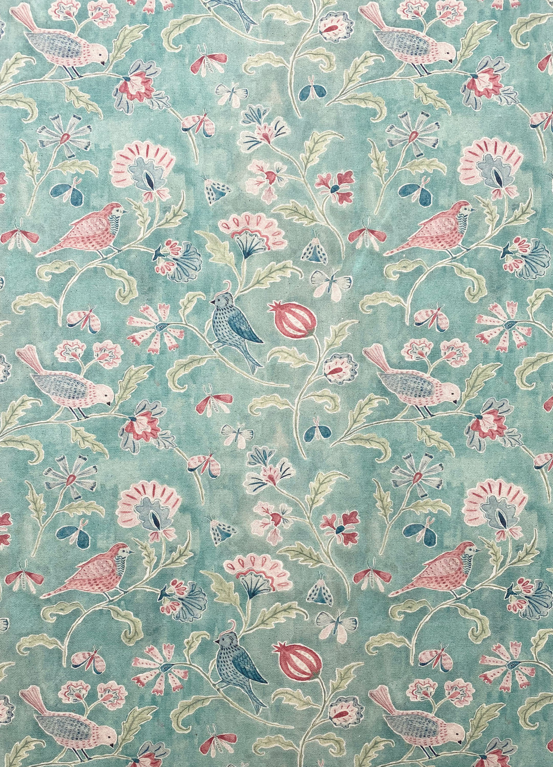 Garden flowers and birds on an emerald watercolour background on panama cotton